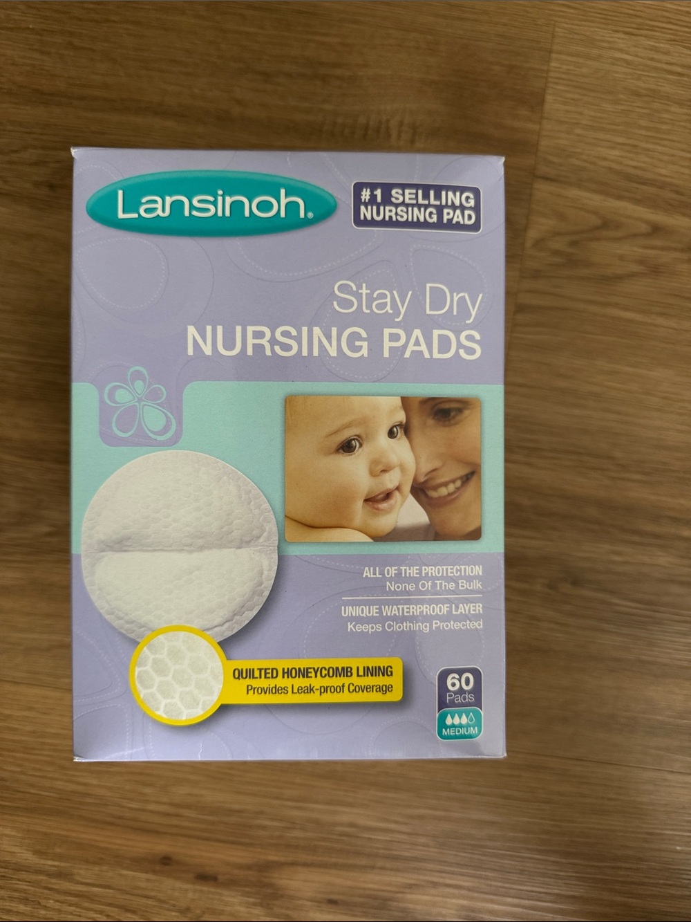 Lansinoh Stay Dry Nursing Pads - Lavender & Teal Box